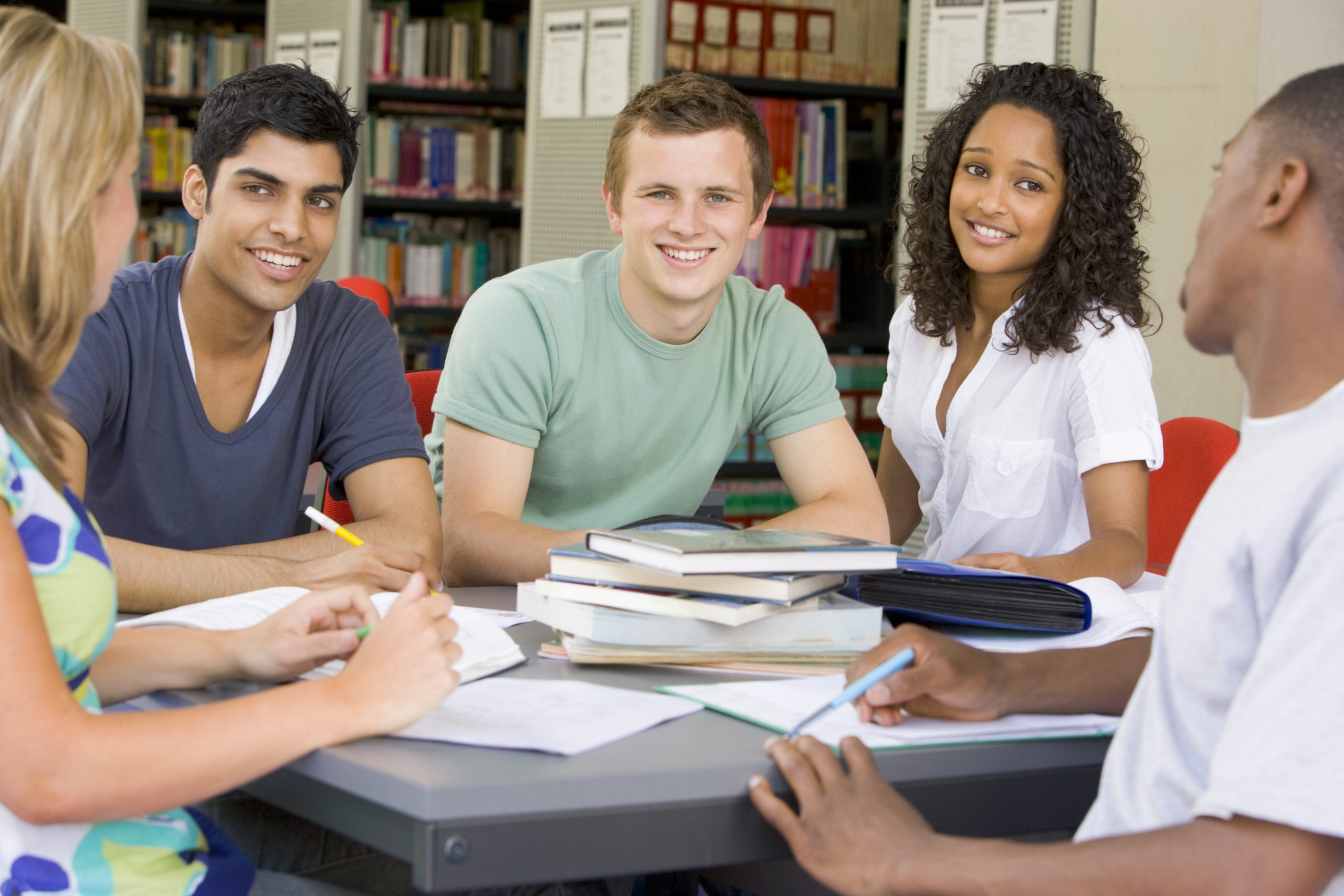 college-students-studying-together-in-a-library_Ht90h5Ari-scaled.jpg